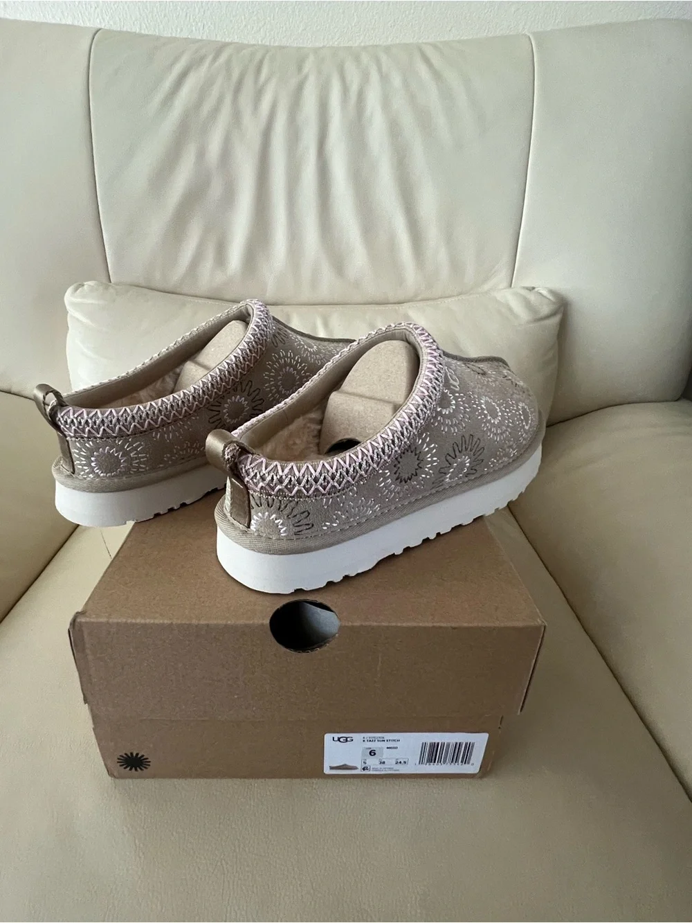 UGG Taupe Slip-On Clogs with Pink & White Embroidered Motifs